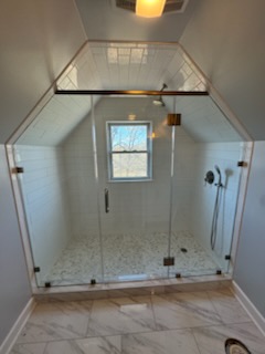 drain-cleaning Custom glass shower enclosure installed by Eagle Glass Shop